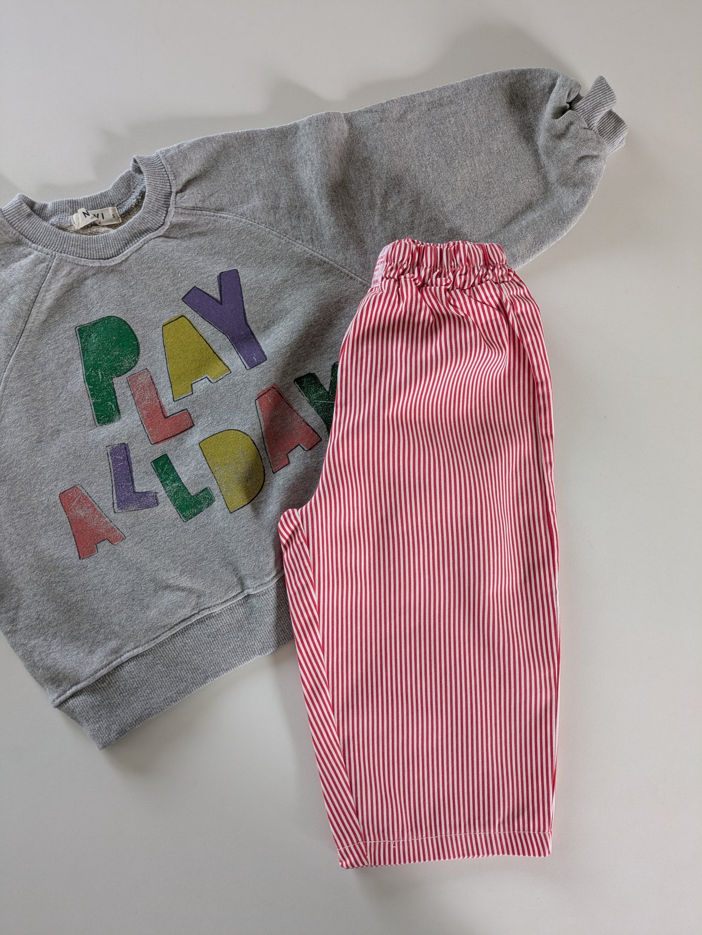 Striped pants red