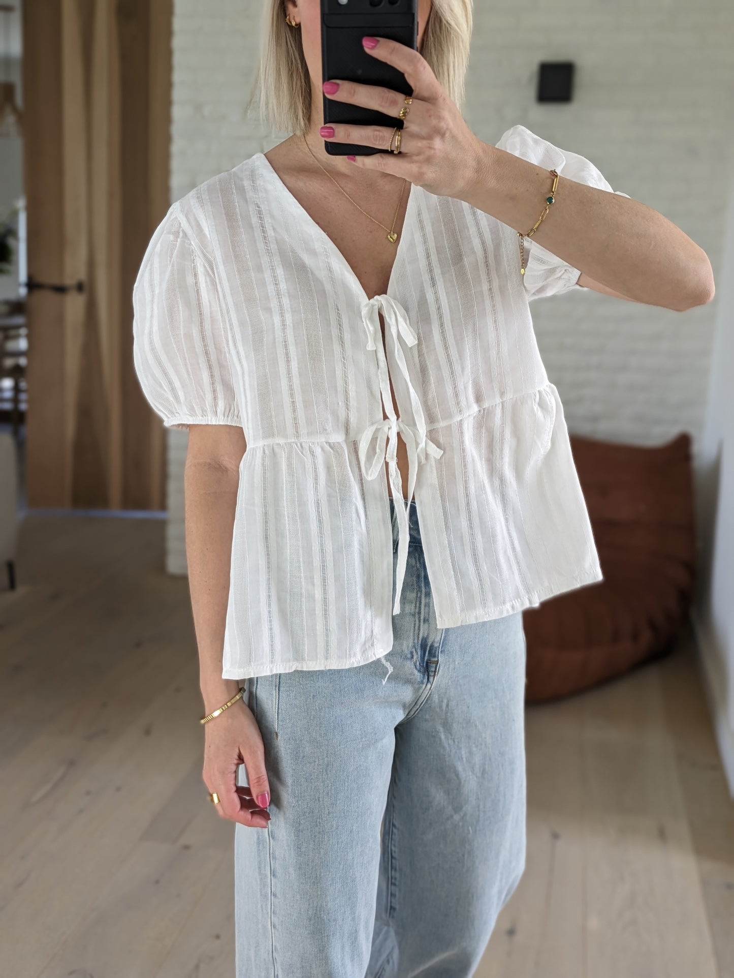 Blouse met strikjes en korte mouwen