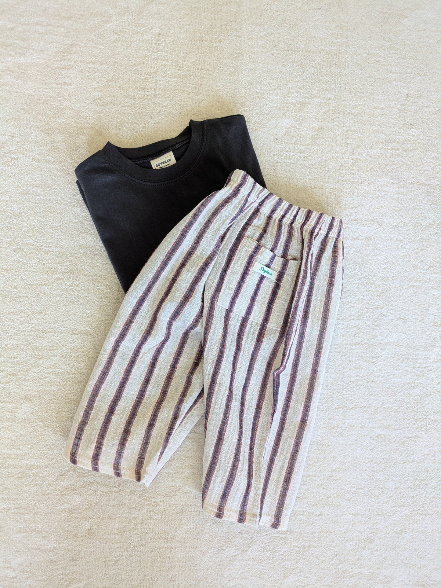 Striped pants red