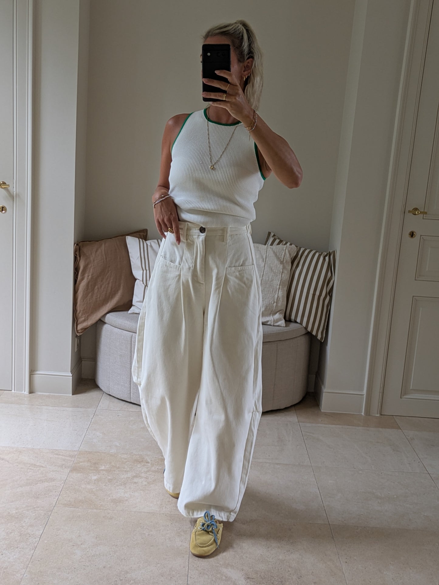 White top with green
