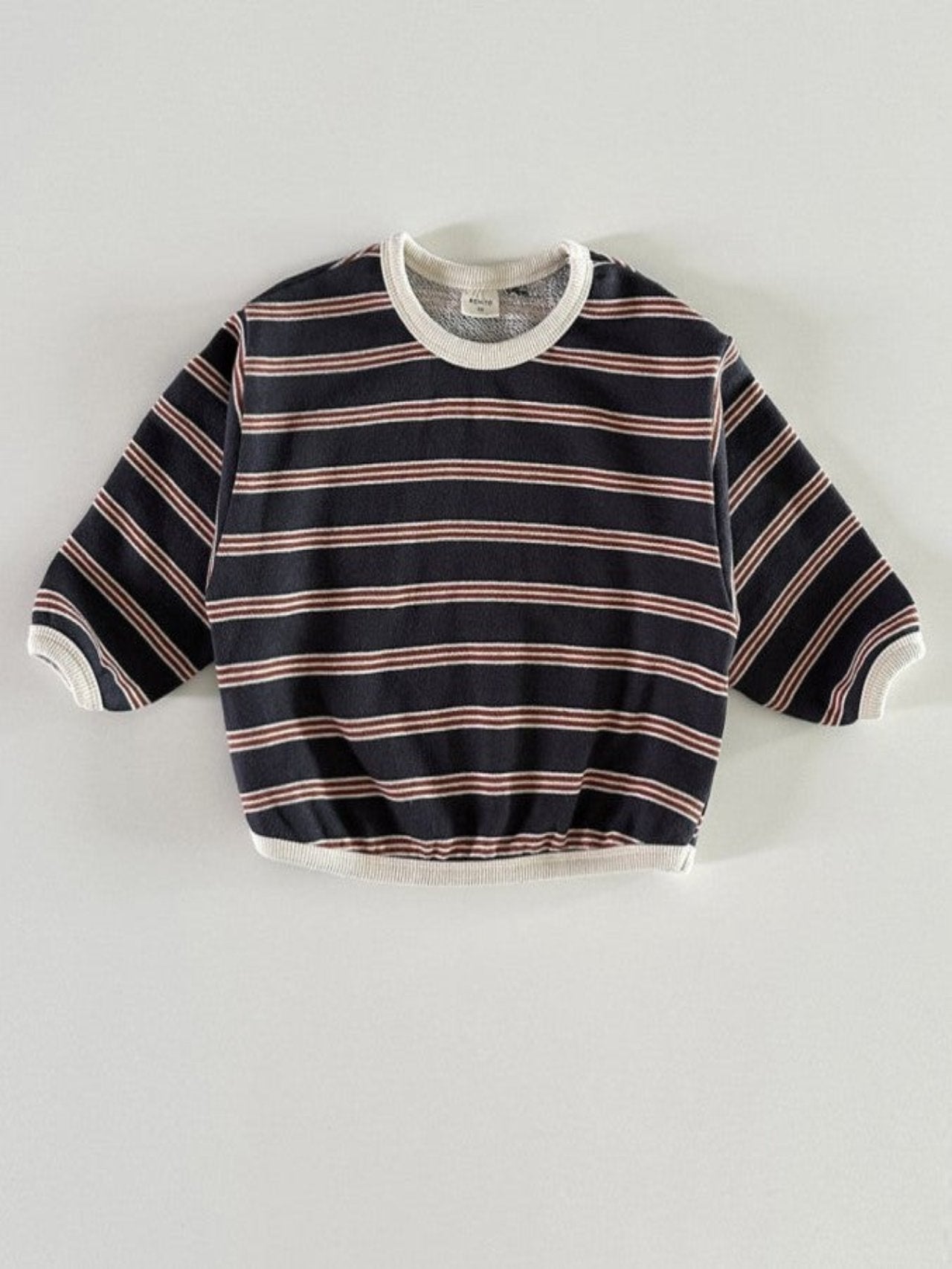 Striped piping sweater